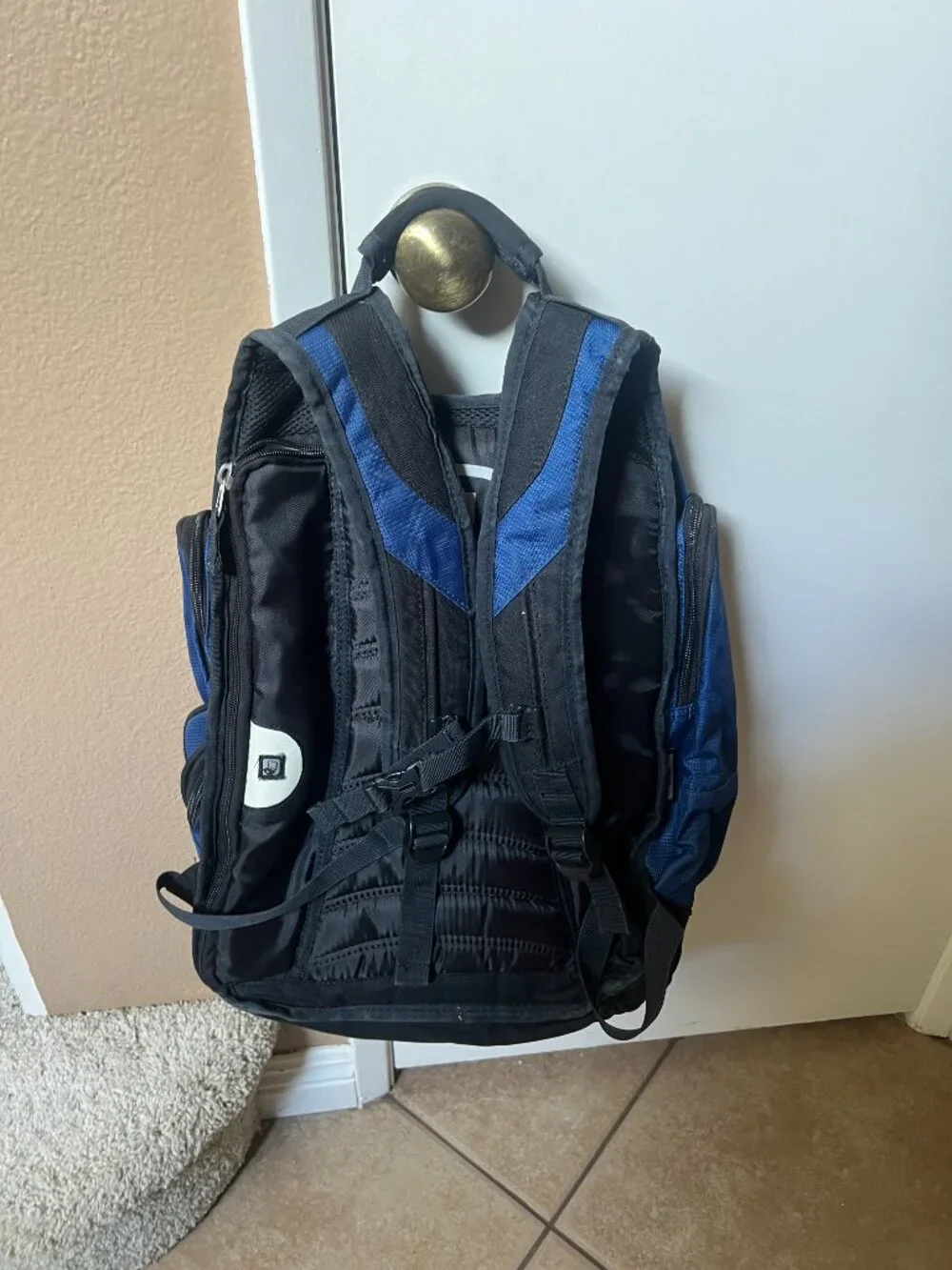blue OGIO Metro backpack with embroidered Miller Lite branding